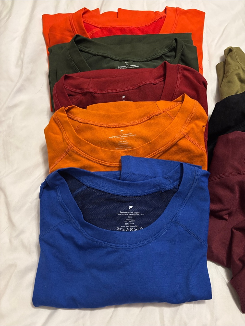 Fabletics menβs Training Day shirt bundle. 4 short sleeve, 3 long sleeve (1 NWT)